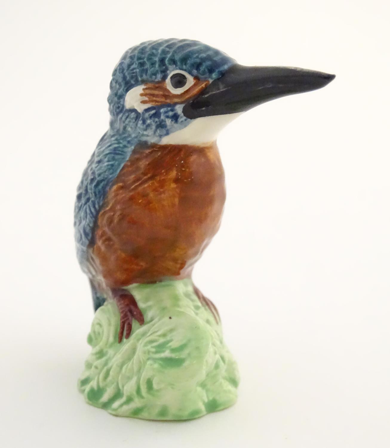 A Beswick model of a kingfisher bird, model no. 3275. Marked under. Approx. 2 3/4" high. Please Note