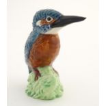 A Beswick model of a kingfisher bird, model no. 3275. Marked under. Approx. 2 3/4" high. Please Note