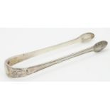 18thC silver sugar tongs with bright cut decoration. Maker GS ( probably George Smith II) 5" long (