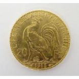 A French Republic 20 franc gold coin, 1913, approx. 6.45g Please Note - we do not make reference