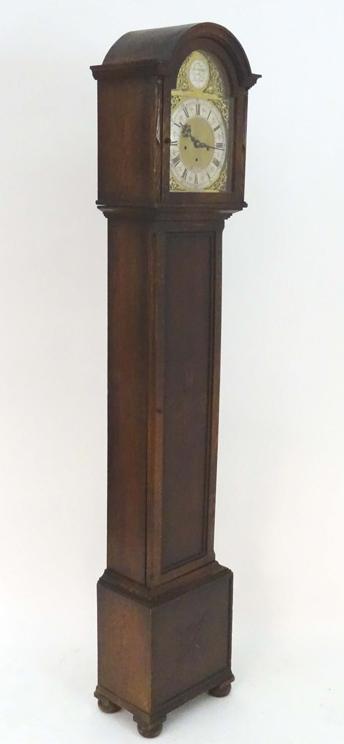 A c.1920 longcase / grandmother clock having an 8 day movement, Westminster chimes, having an ornate - Image 6 of 27