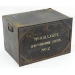 A mid-20thC steel deed box, black painted finish with white stenciled lettering: 'Mrs K.H.V. Grey.