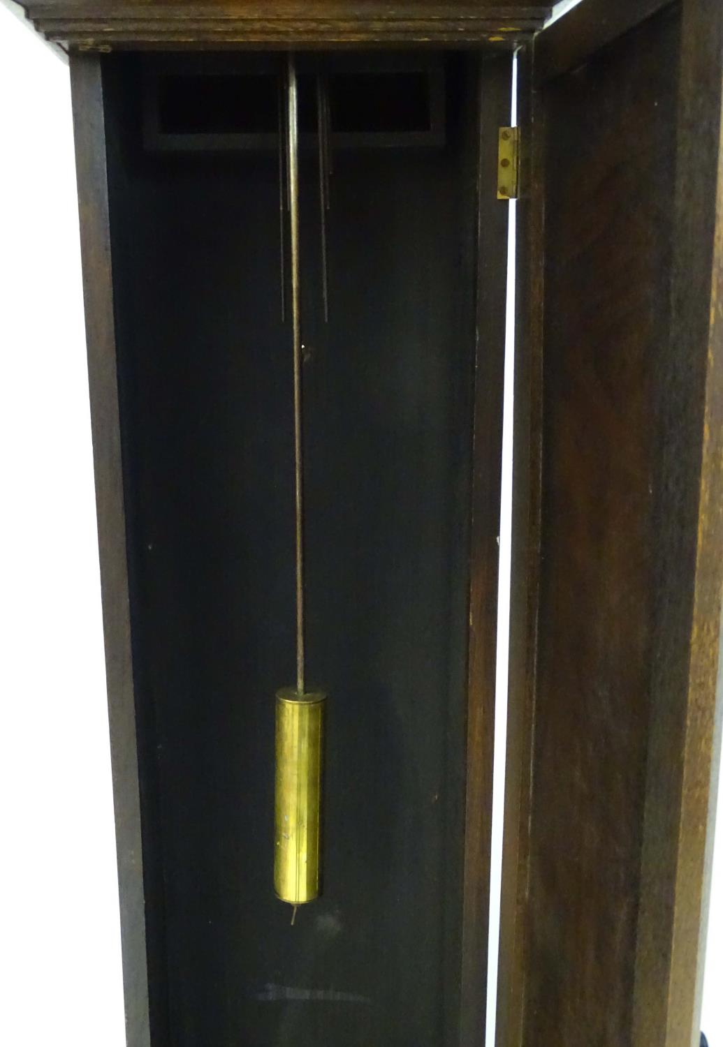 A c.1920 longcase / grandmother clock having an 8 day movement, Westminster chimes, having an ornate - Image 25 of 27