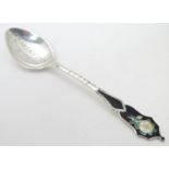 A Sterling silver souvenir spoon with enamel decoration to handle, engraved ' Edmonton' to bowl 3