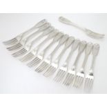 A set of twelve Victorian Fiddle and Thread pattern dessert forks with engraved armorial to