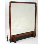 A large mid 20thC Art Deco mirror with a walnut and ebonised frame. 60'' wide x 73'' high Please