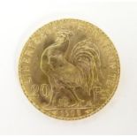 A French Republic 20 franc gold coin, 1908, approx. 6.45g Please Note - we do not make reference