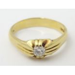 An 18ct gold ring set with diamond solitaire. the diamond approx 0.4ct Hallmarked Sheffield 1975.