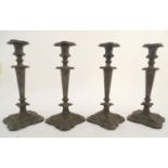 A set of four 19thC Old Sheffield Plate candlesticks. The silver plate candlesticks approx. 12 1/