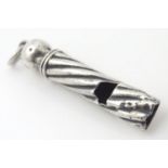 A silver whistle maker AC&Co. 1 3/4" long Please Note - we do not make reference to the condition of