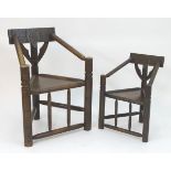 Two 19thC oak turners chairs with carved top rails, incised brackets and bobbin turned arms, the