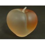An opaque glass paperweight/ornament formed as an apple. 2 3/4" tall Please Note - we do not make