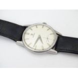 A mid-20thC gentlemans' Omega wristwatch, 1 1/8" dial, fitted with an Omega leather strap Please