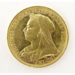 An 1895 gold Victoria sovereign coin. Approx. weight 8g Please Note - we do not make reference to