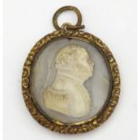 A 19thC oval cameo depicting a profile miniature portrait of a military gentleman in uniform.