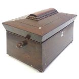 A 19thC mahogany three sectional tea caddy of sarcophagus form, with inlaid mother of pearl