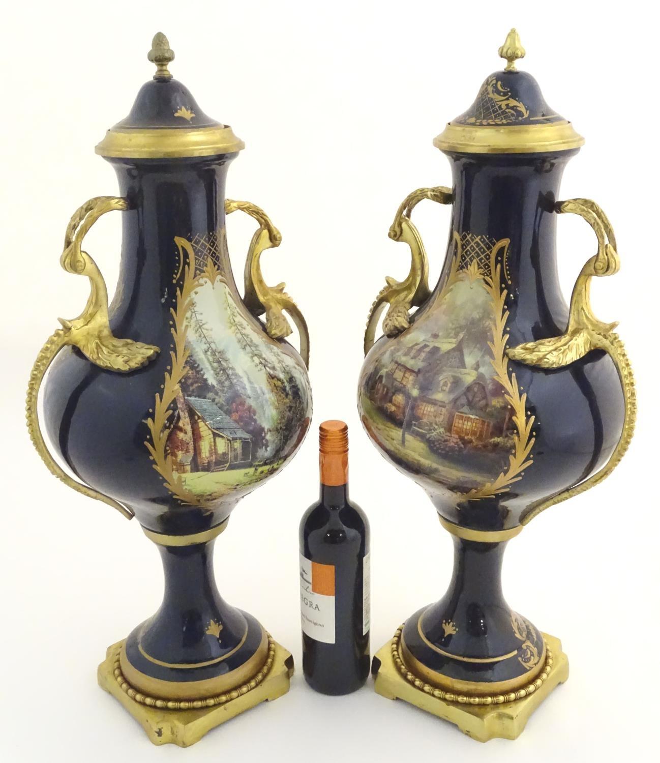 A matched pair of Sevres style lidded urn garnitures on mounted bases, with cobalt blue - Image 4 of 11