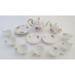 A quantity of Rosenthal tea wares in the Pompadour shape with floral decoration and gilt highlights.