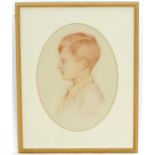 Harold Cox (act. 1921-), English School, Crayon on paper, An oval profile portrait of a young boy,