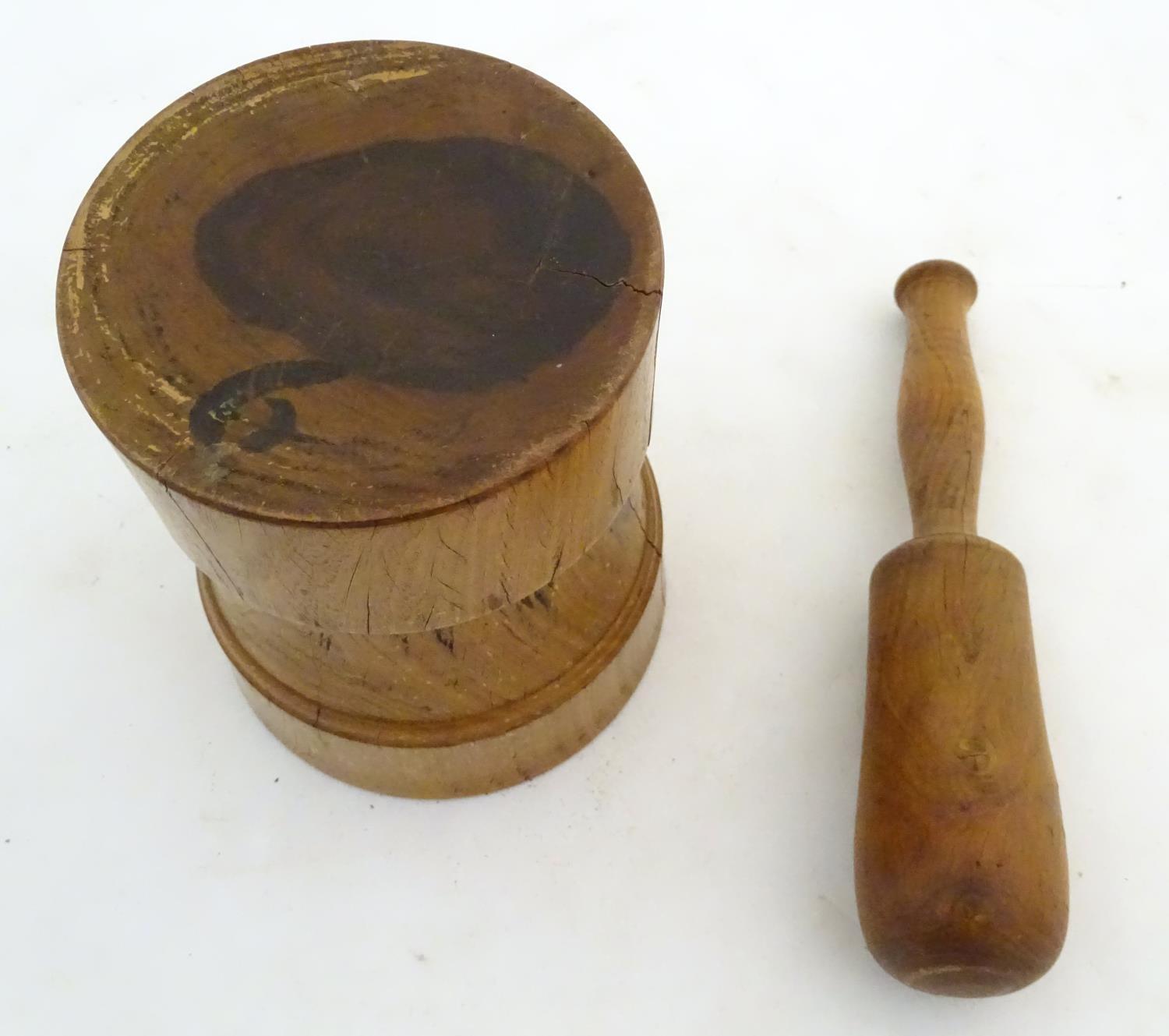 Kitchenalia: a continental 19thC Treen turned elm pestle and mortar, measuring 9 3/4" and 6 3/4" - Image 2 of 5