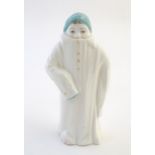 A Royal Worcester figural candle snuffer modelled as Toddie from Helen's Babies at Play by John