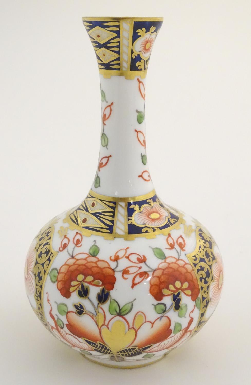 A 19thC Stevenson and Hancock Derby vase decorated with flowers in the Imari palette. Marked - Image 3 of 7