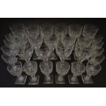Glass: an extensive, graduated set of 19thC drinking glasses, each decorated with etched floral