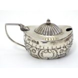 A Victorian oval mustard pot hallmarked Chester 1894 maker William Aitken. 3 1/4" long Please Note -