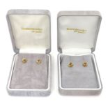 Two pairs of 9ct gold stud earrings Please Note - we do not make reference to the condition of