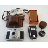 A mid-20thC Agfa Silette film camera, with cased & boxed Agfa flaskgun and operating instructions.