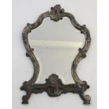 A late 19thC cast brass mirror with acanthus and C scroll decoration. Approx. 17 1/4" x 11 1/4"