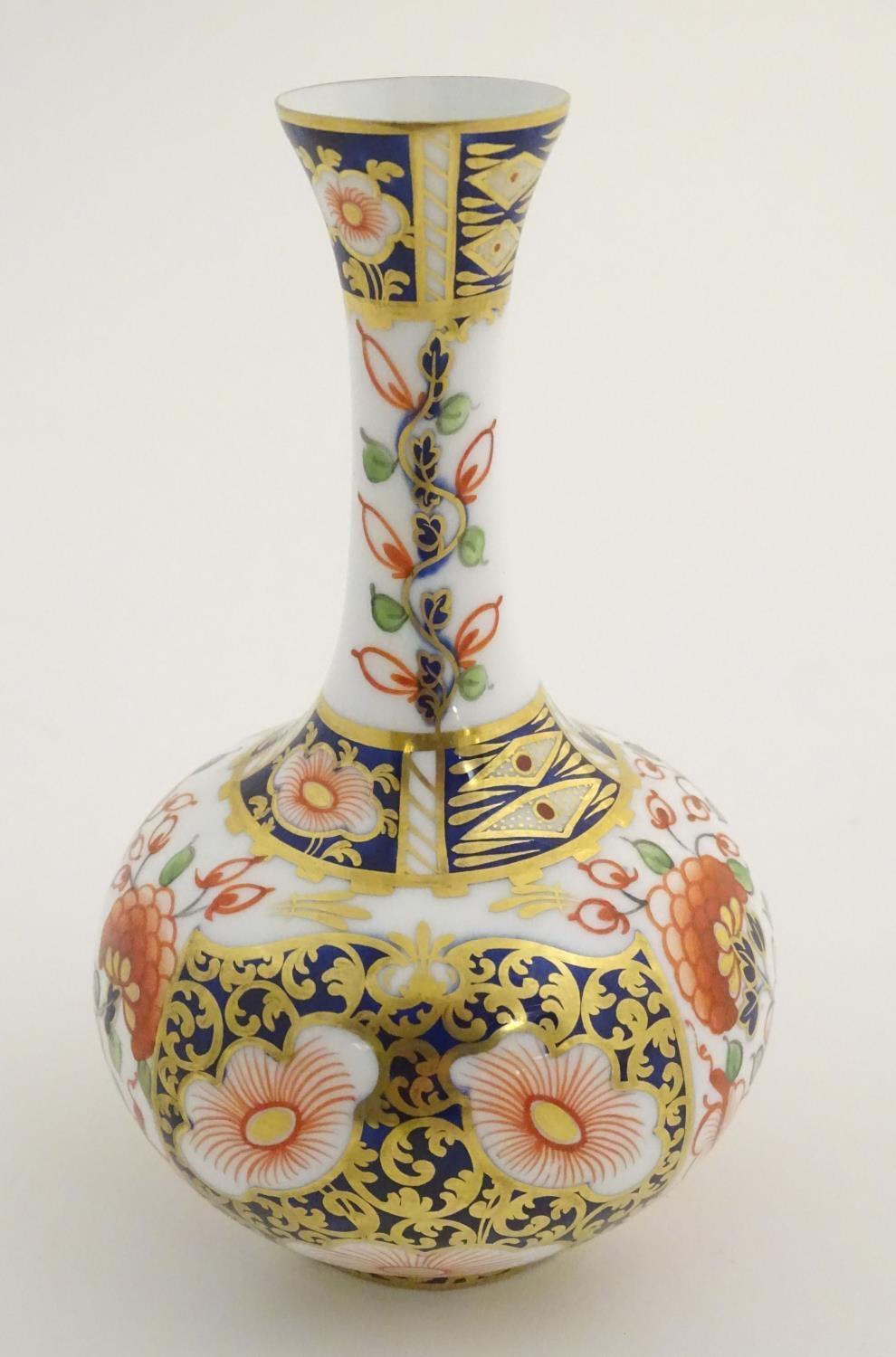 A 19thC Stevenson and Hancock Derby vase decorated with flowers in the Imari palette. Marked - Image 4 of 7