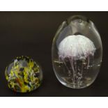 Glass: a 20thC studio glass paperweight by Eric Simonin, France, of knop form with internal