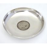 A Pakistan silver pin dish with one rupee 1948 Pakistan coin set to centre. 3" diameter Please