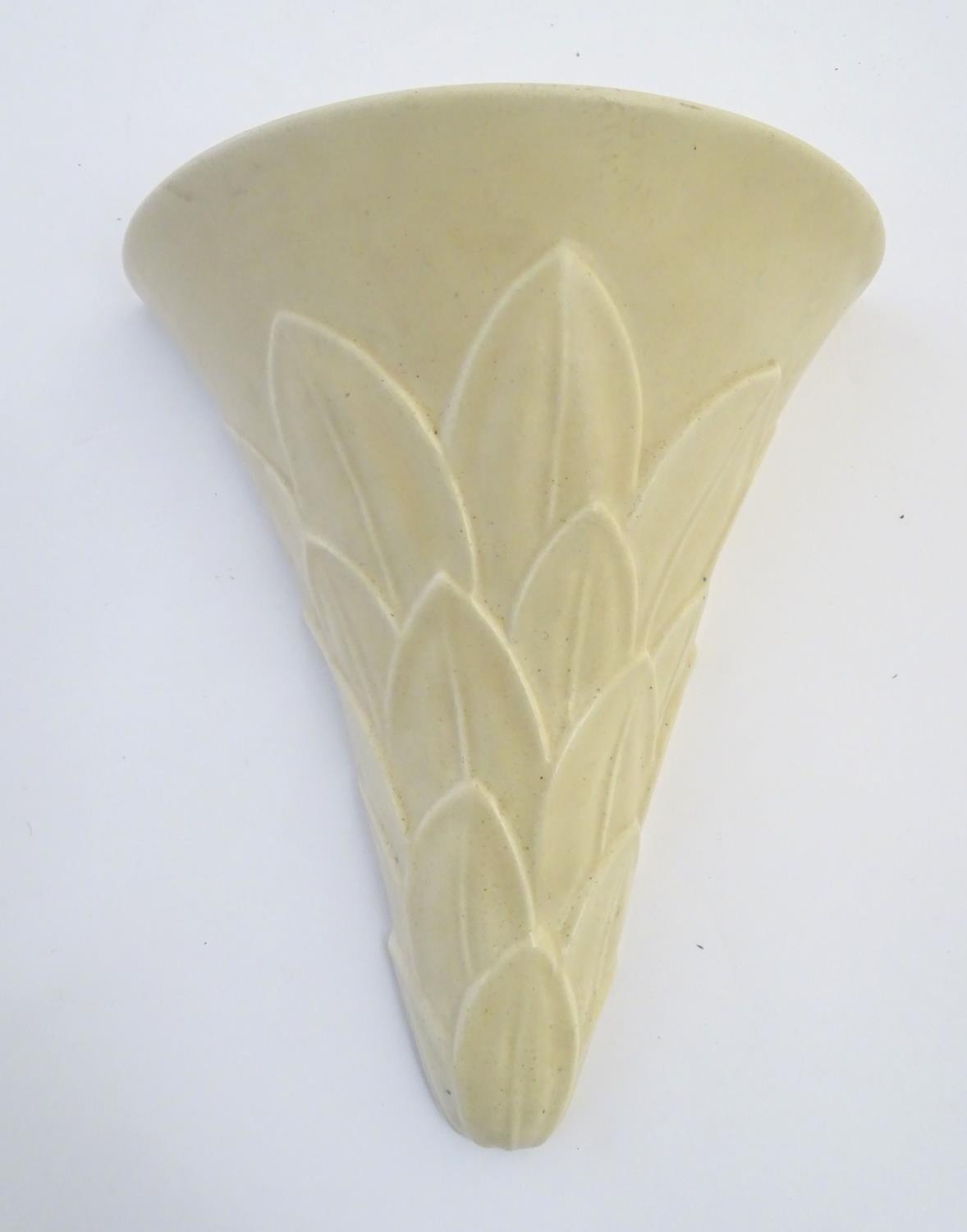 A Gray's pottery Art Deco style wall pocket / vase with leaf decoration. Marked verso. Approx. 9"