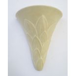 A Gray's pottery Art Deco style wall pocket / vase with leaf decoration. Marked verso. Approx. 9"