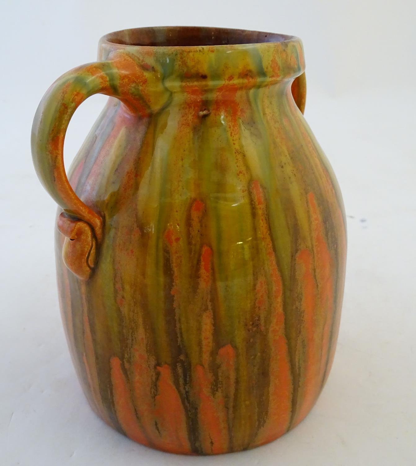 A Brannam of Barnstaple twin handled Barum ware vase with and orange and ochre drip glaze, the - Image 3 of 8