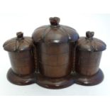 An unusual late 19th / early 20thC treen three- sectional box, possibly a caddy, the cylindrical