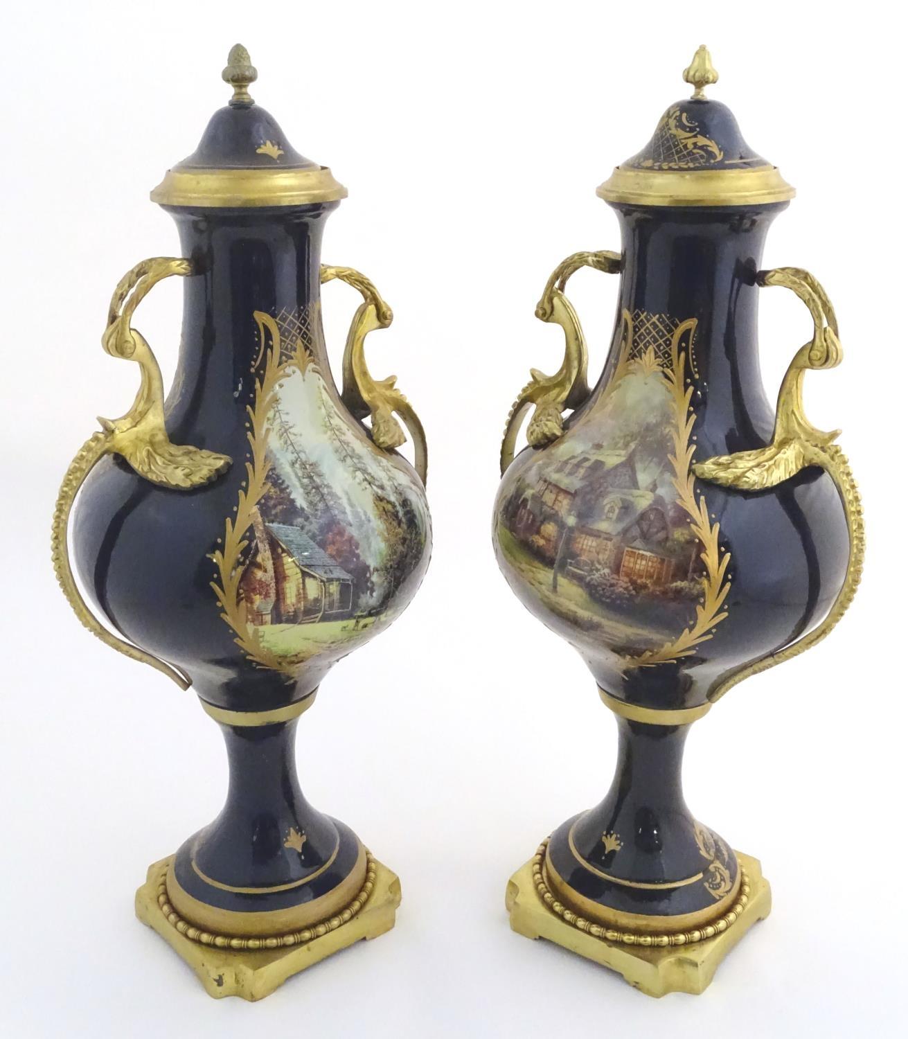 A matched pair of Sevres style lidded urn garnitures on mounted bases, with cobalt blue - Image 3 of 11