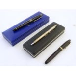 A cased ball pen by Cross USA, marked 925 silver, together with a Swan 'leverless' fountain pen, the