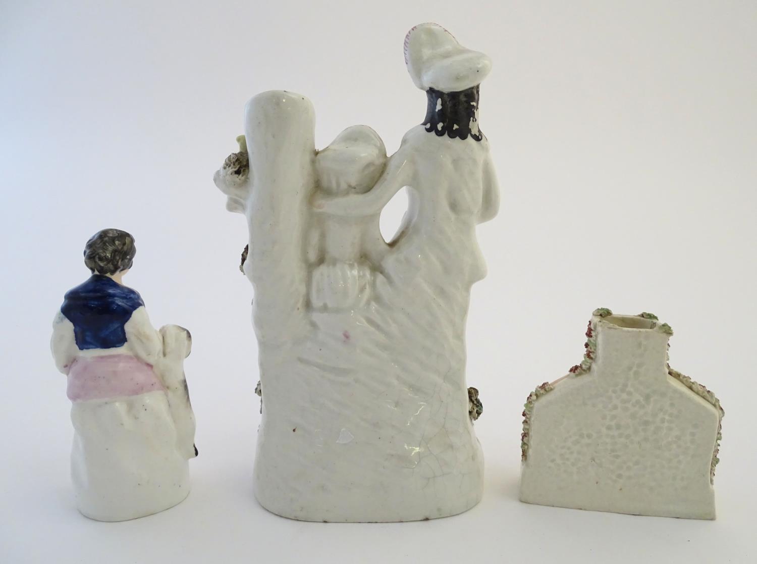 Three items of Staffordshire pottery, to include a figural bud vase, a flatback house and a figure - Image 5 of 9