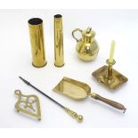 A quantity of assorted brassware, to include a chamber stick, lamp, trivet, First & Second World War