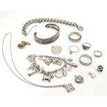 Assorted jewellery to include silver bangle bracket silver charm bracelet with various charms etc