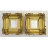 A pair of 19thC gilt mirrors, the frames cornered with acanthus scroll and shell and pearl