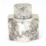A Dutch silver caddy embossed with various scenes and scroll detail bearing marks for Berthold