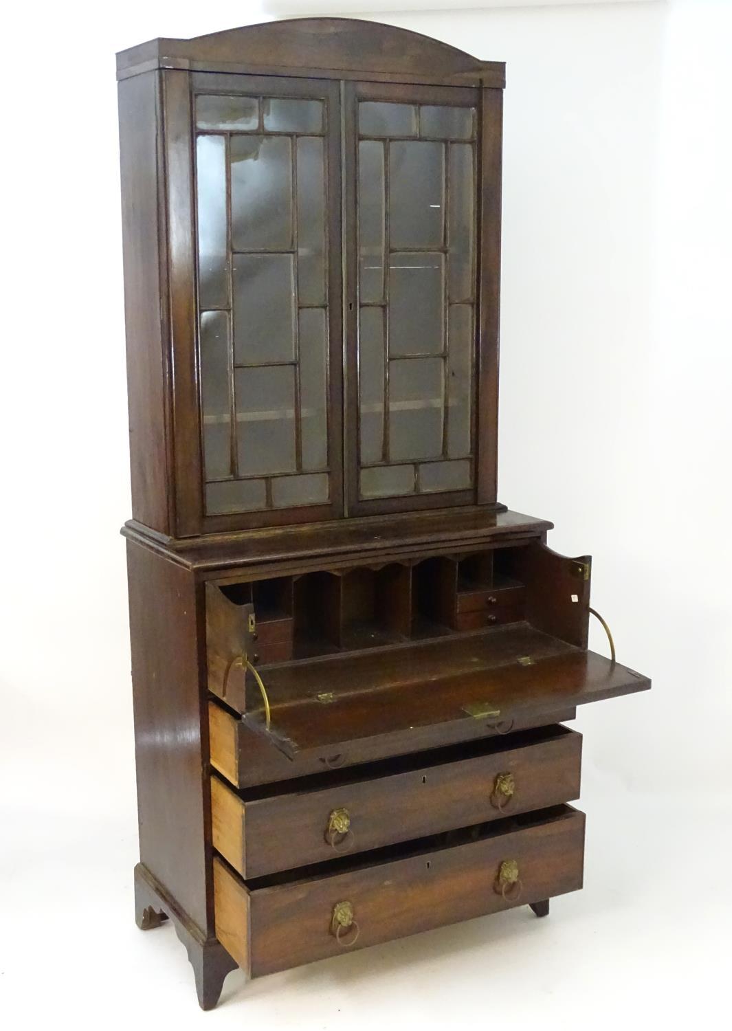 An early 19thC rosewood secretaire bookcase with an arched pediment above two astragal glazed doors, - Image 5 of 8