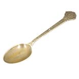 A silver teaspoon with Celtic decoration and engraved M.L.G.C (possibly Mount Lawley Golf Club ).