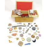 A quantity of assorted jewellery to include brooches, earrings, rings, necklaces etc. and a