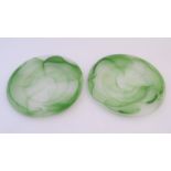 A pair of Art Deco frosted glass plates, each with green waved abstract decoration and measuring 13"