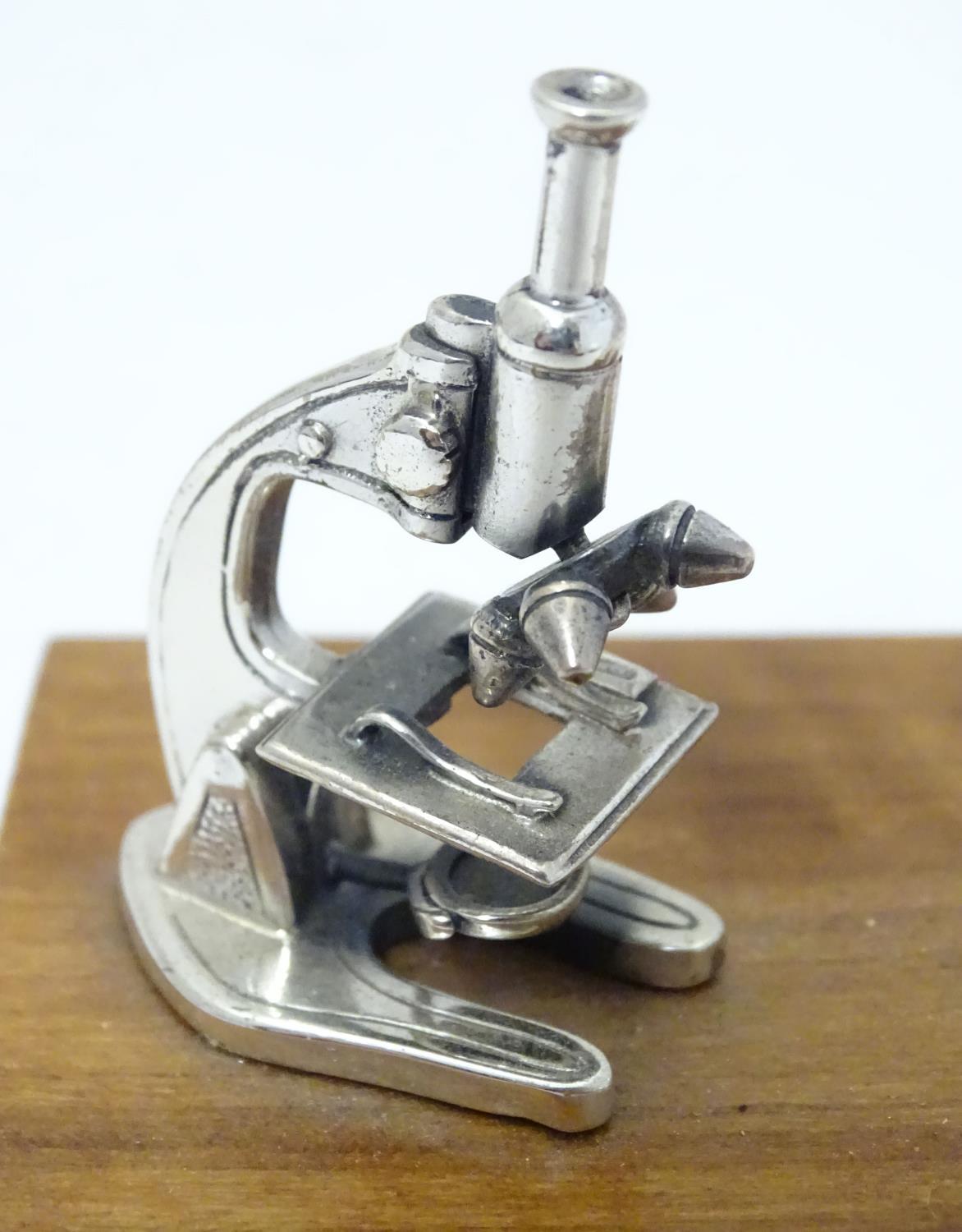 A Continental .925 silver miniature model of a microscope etc. mounted on a wooden base. Approx. - Image 6 of 8